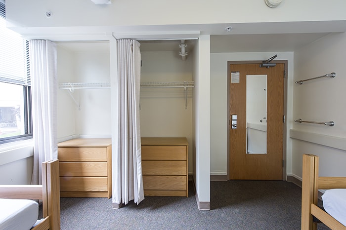 Scobell House Traditional Double - two dressers closets and a door with a mirror on it